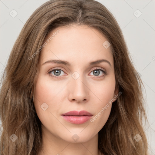 Joyful white young-adult female with long  brown hair and green eyes