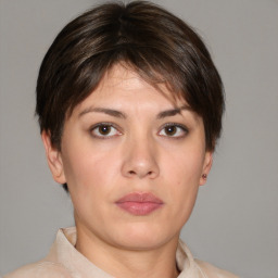 Neutral white young-adult female with short  brown hair and brown eyes