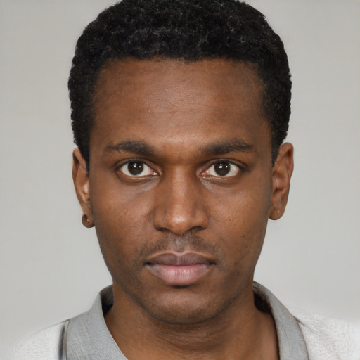 Neutral black young-adult male with short  black hair and brown eyes