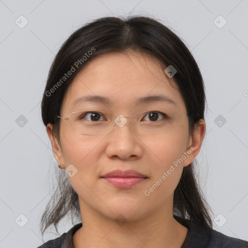 Joyful white young-adult female with medium  brown hair and brown eyes