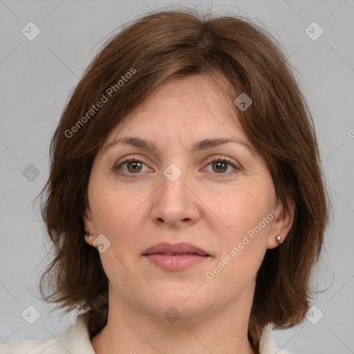 Joyful white adult female with medium  brown hair and grey eyes