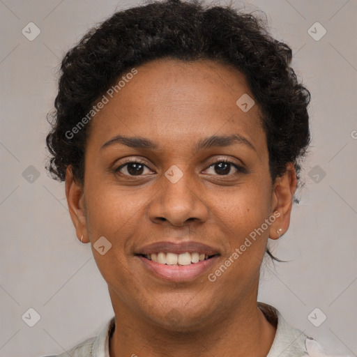 Joyful black young-adult female with short  brown hair and brown eyes