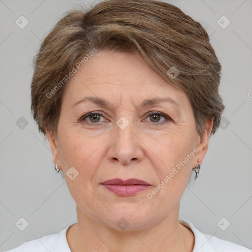 Joyful white adult female with short  brown hair and brown eyes