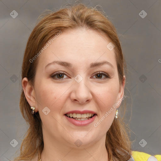 Joyful white adult female with medium  brown hair and brown eyes