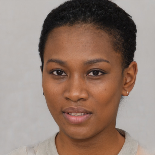 Neutral black young-adult female with short  black hair and brown eyes
