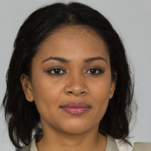 Joyful asian young-adult female with medium  brown hair and brown eyes