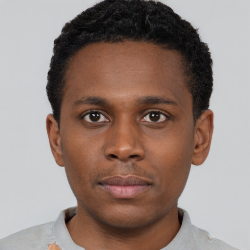 Neutral black young-adult male with short  brown hair and brown eyes