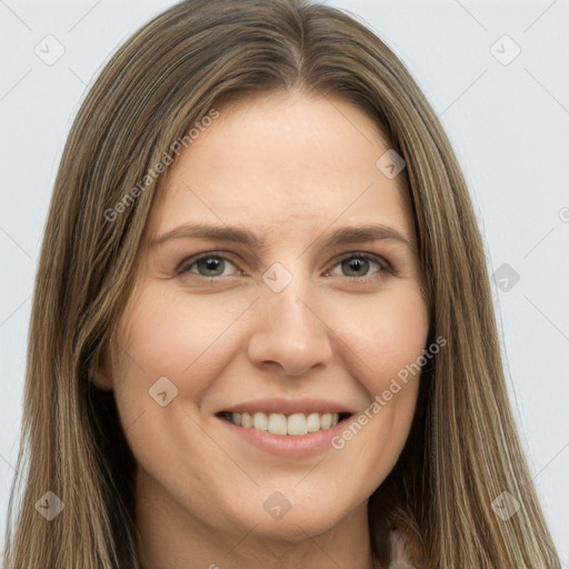 Joyful white young-adult female with long  brown hair and green eyes