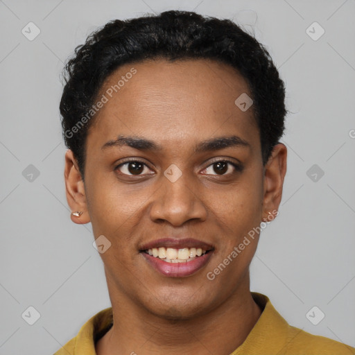 Joyful black young-adult female with short  black hair and brown eyes