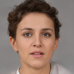 Neutral white young-adult female with short  brown hair and brown eyes