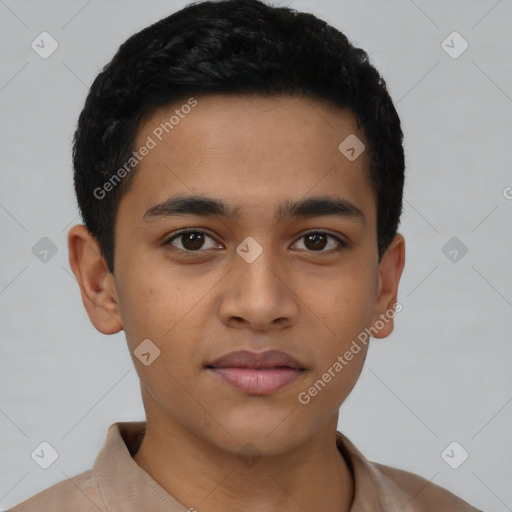 Joyful latino young-adult male with short  brown hair and brown eyes