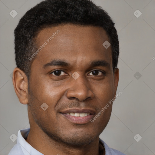 Joyful black young-adult male with short  brown hair and brown eyes