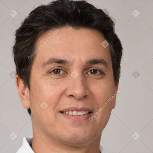 Joyful white adult male with short  brown hair and brown eyes