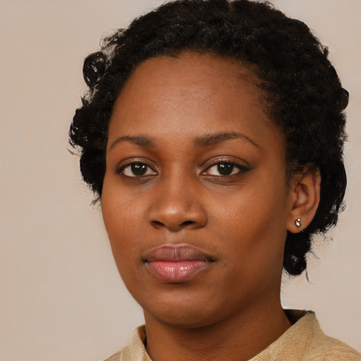Neutral black young-adult female with medium  black hair and brown eyes