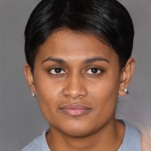 Joyful asian young-adult female with short  brown hair and brown eyes