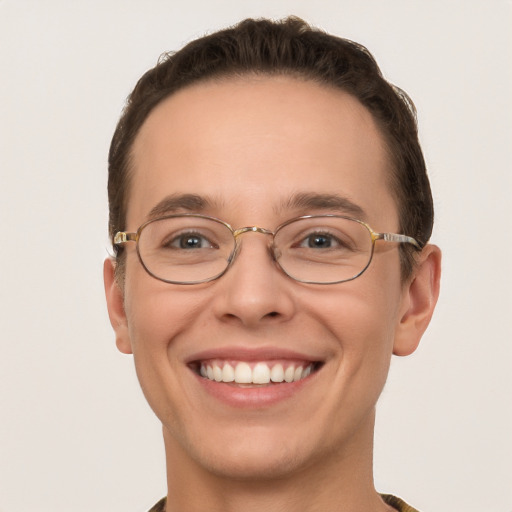 Joyful white adult male with short  brown hair and grey eyes