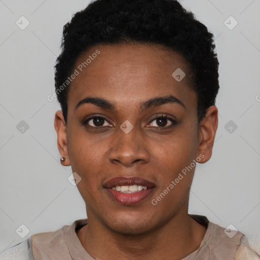 Joyful black young-adult female with short  black hair and brown eyes