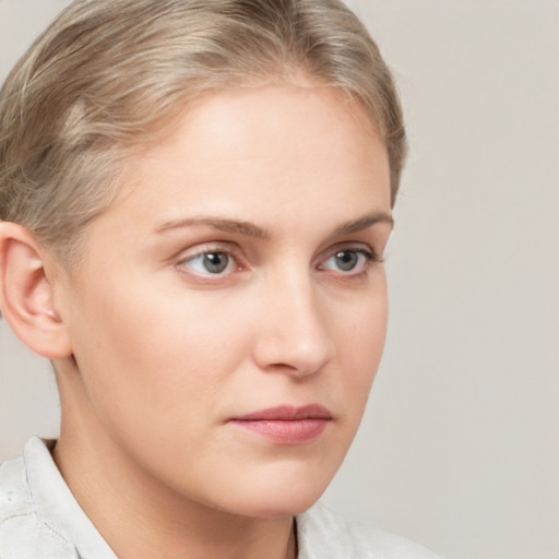 Neutral white young-adult female with medium  brown hair and blue eyes