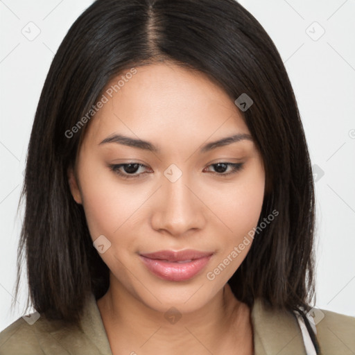 Joyful asian young-adult female with long  brown hair and brown eyes