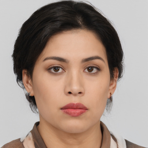 Neutral asian young-adult female with medium  brown hair and brown eyes