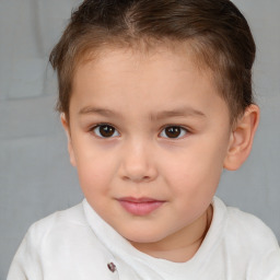 Joyful white child female with short  brown hair and brown eyes