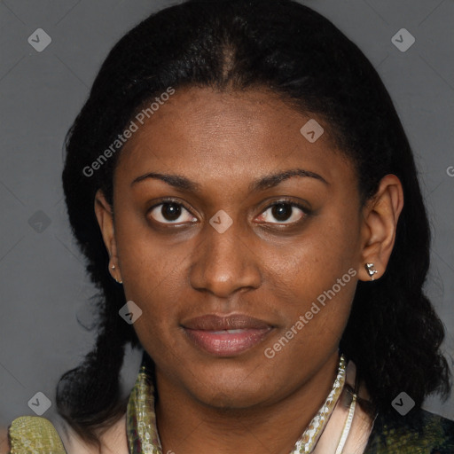 Joyful black young-adult female with long  brown hair and brown eyes