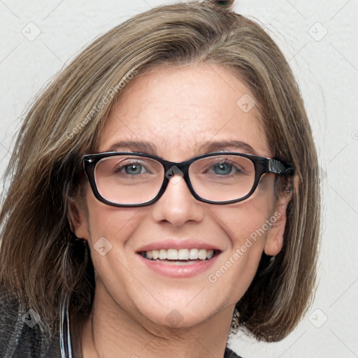 Joyful white adult female with medium  brown hair and blue eyes