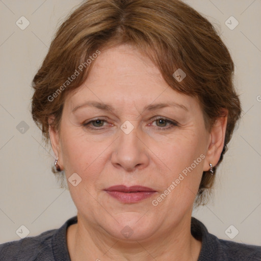 Joyful white adult female with medium  brown hair and blue eyes