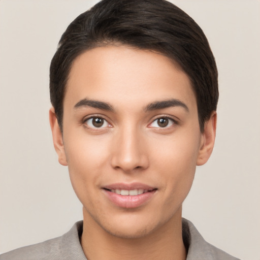 Joyful white young-adult female with short  brown hair and brown eyes