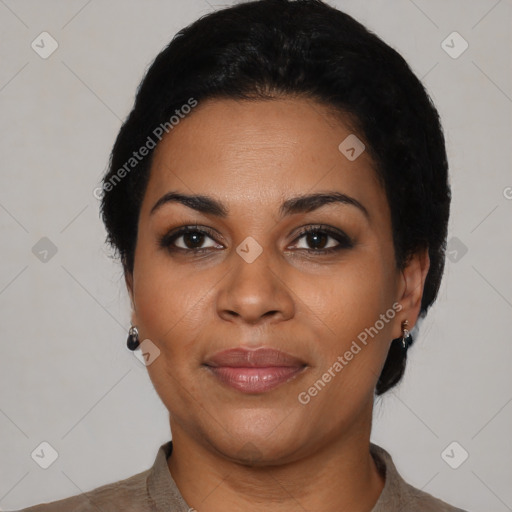 Joyful latino young-adult female with short  black hair and brown eyes