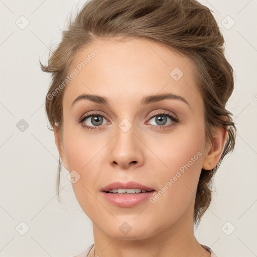 Joyful white young-adult female with medium  brown hair and green eyes