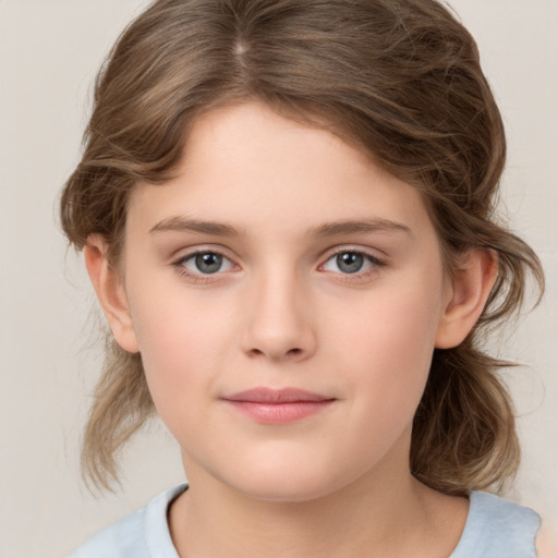 Joyful white child female with medium  brown hair and brown eyes