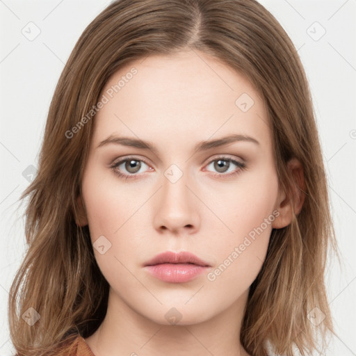 Neutral white young-adult female with long  brown hair and brown eyes