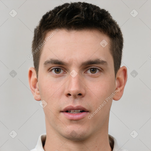 Neutral white young-adult male with short  brown hair and brown eyes