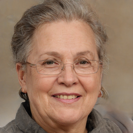 Joyful white middle-aged female with medium  brown hair and brown eyes