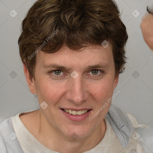 Joyful white young-adult female with short  brown hair and blue eyes