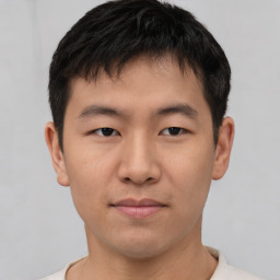 Neutral asian young-adult male with short  brown hair and brown eyes