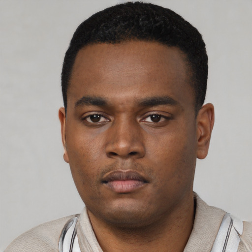Neutral black young-adult male with short  black hair and brown eyes