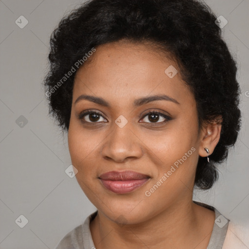 Joyful black young-adult female with medium  black hair and brown eyes