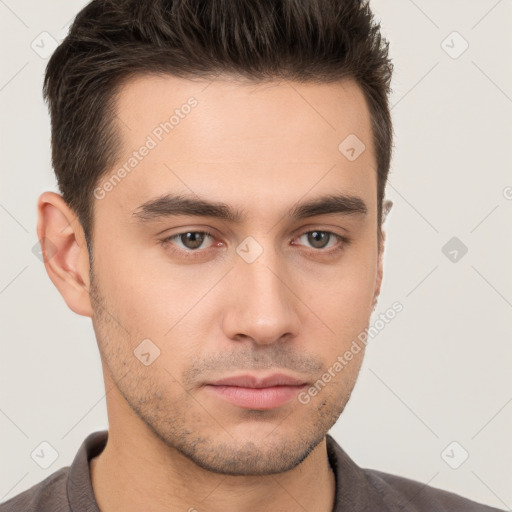 Neutral white young-adult male with short  brown hair and brown eyes