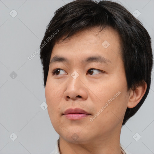 Neutral asian young-adult male with short  black hair and brown eyes