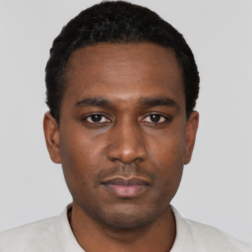 Neutral black young-adult male with short  black hair and brown eyes
