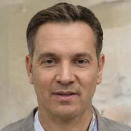 Neutral white adult male with short  brown hair and brown eyes