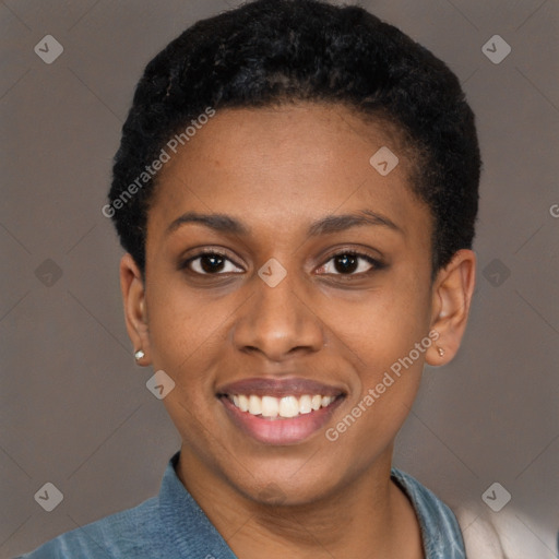 Joyful black young-adult female with short  black hair and brown eyes