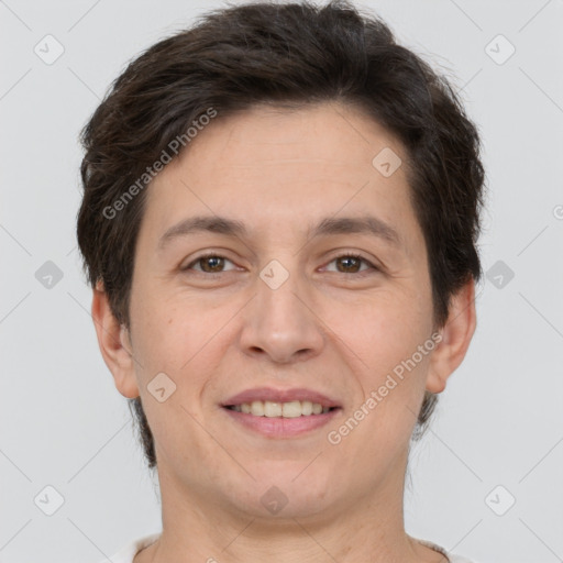 Joyful white adult female with short  brown hair and brown eyes