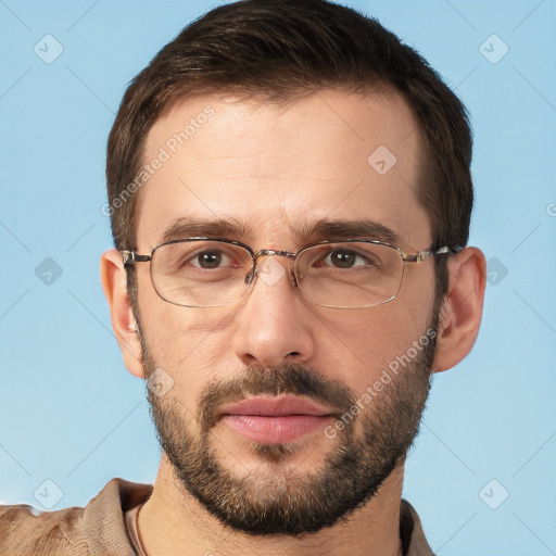 Joyful white adult male with short  brown hair and brown eyes