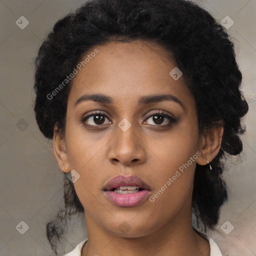 Neutral black young-adult female with medium  black hair and brown eyes