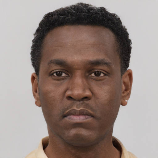 Neutral black young-adult male with short  brown hair and brown eyes