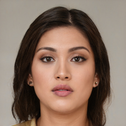 Neutral white young-adult female with medium  brown hair and brown eyes