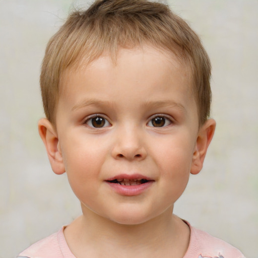 Joyful white child male with short  brown hair and brown eyes